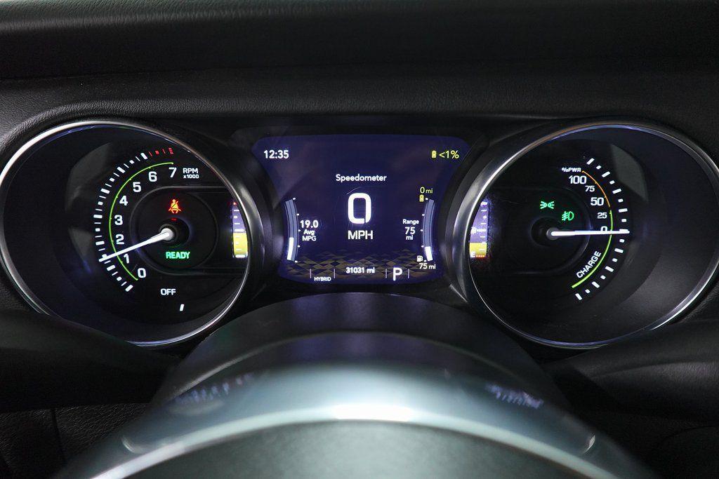 used 2023 Jeep Wrangler 4xe car, priced at $28,609