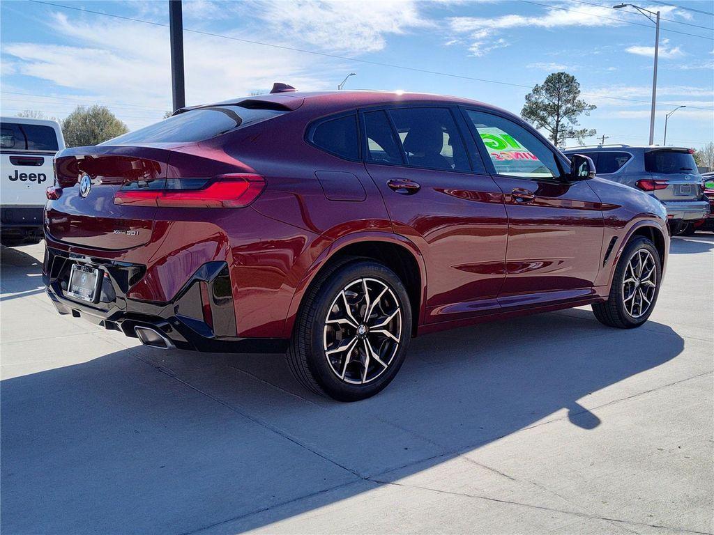 used 2025 BMW X4 car, priced at $54,970