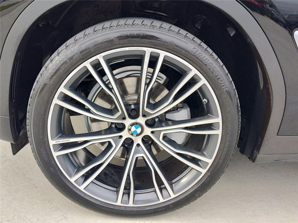 used 2022 BMW X4 car, priced at $35,970