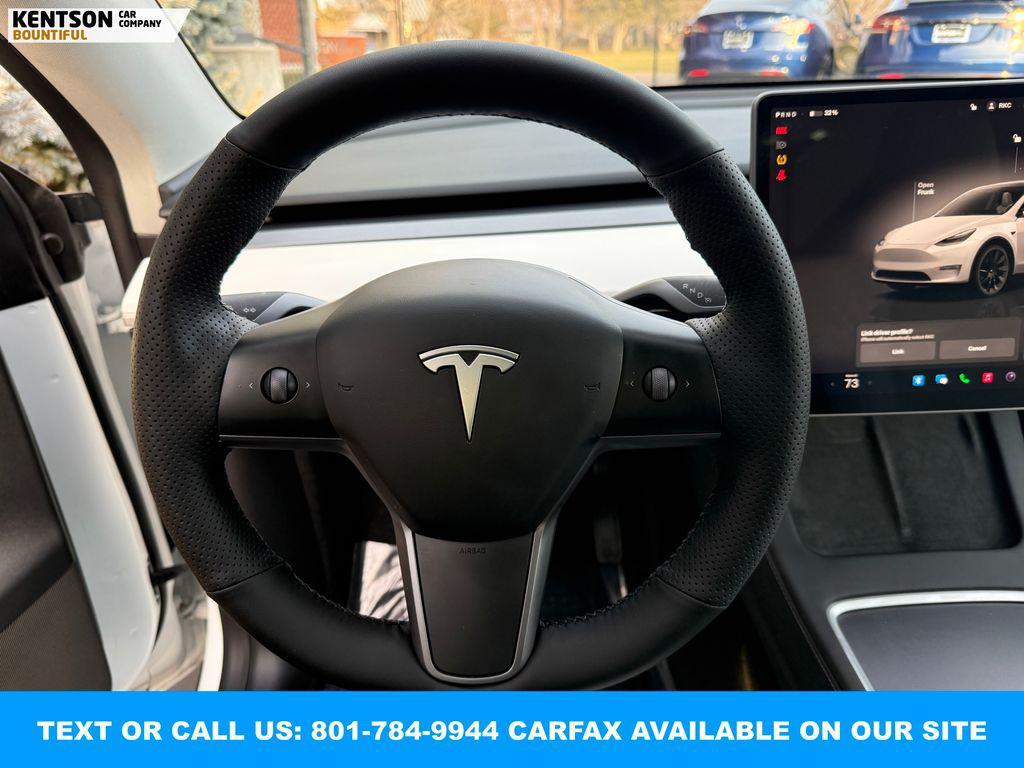 used 2023 Tesla Model Y car, priced at $32,950