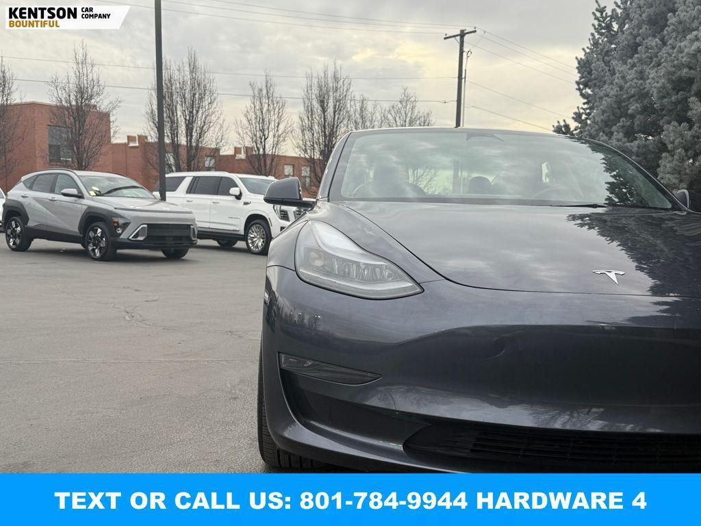 used 2023 Tesla Model 3 car, priced at $29,950