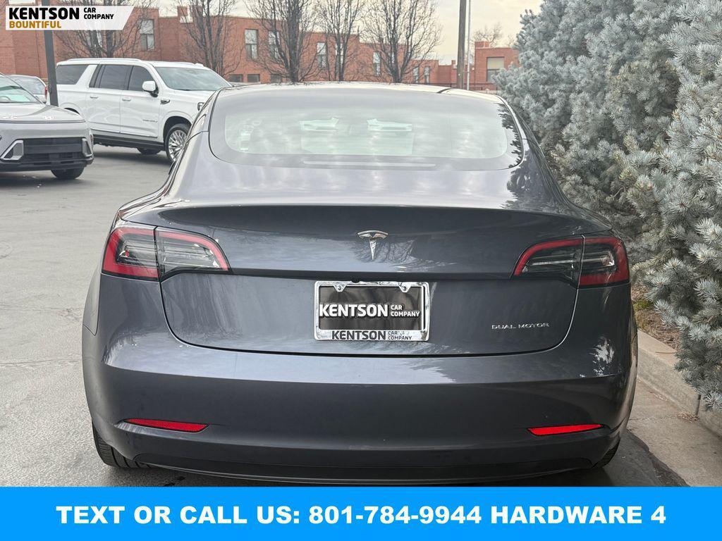 used 2023 Tesla Model 3 car, priced at $29,950