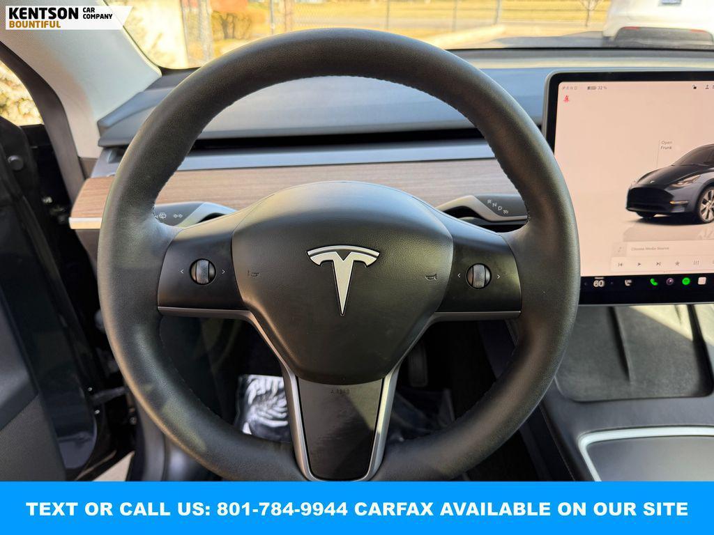 used 2024 Tesla Model Y car, priced at $36,450