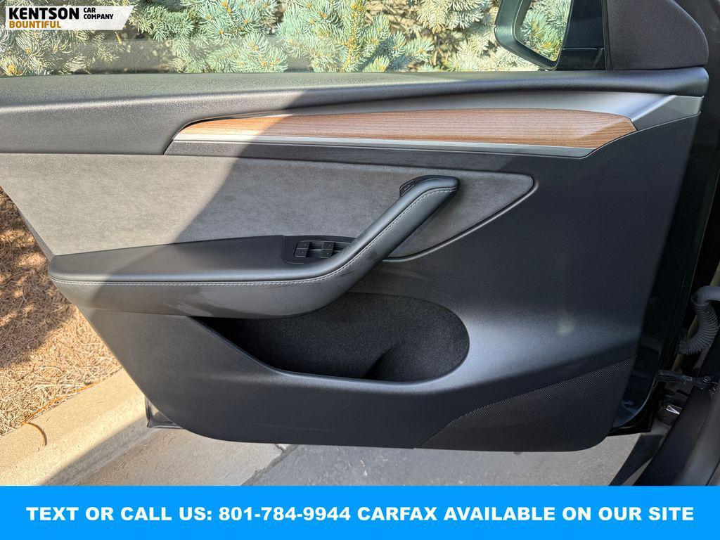 used 2024 Tesla Model Y car, priced at $36,450