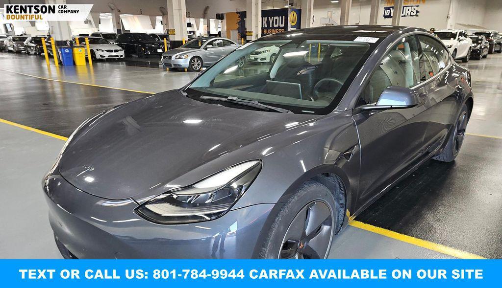 used 2023 Tesla Model 3 car, priced at $29,950