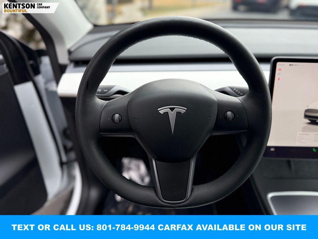 used 2025 Tesla Model Y car, priced at $40,650