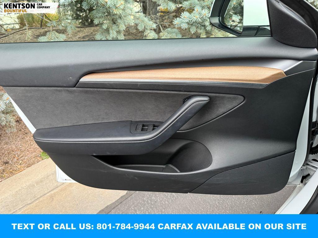 used 2023 Tesla Model 3 car, priced at $23,950