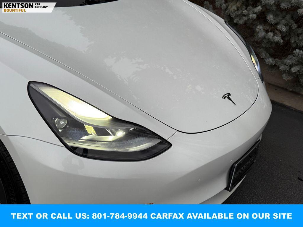 used 2023 Tesla Model 3 car, priced at $23,950