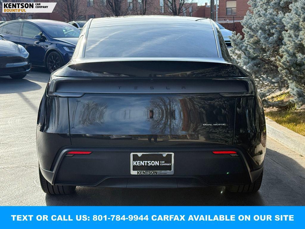 used 2026 Tesla Model Y car, priced at $46,950