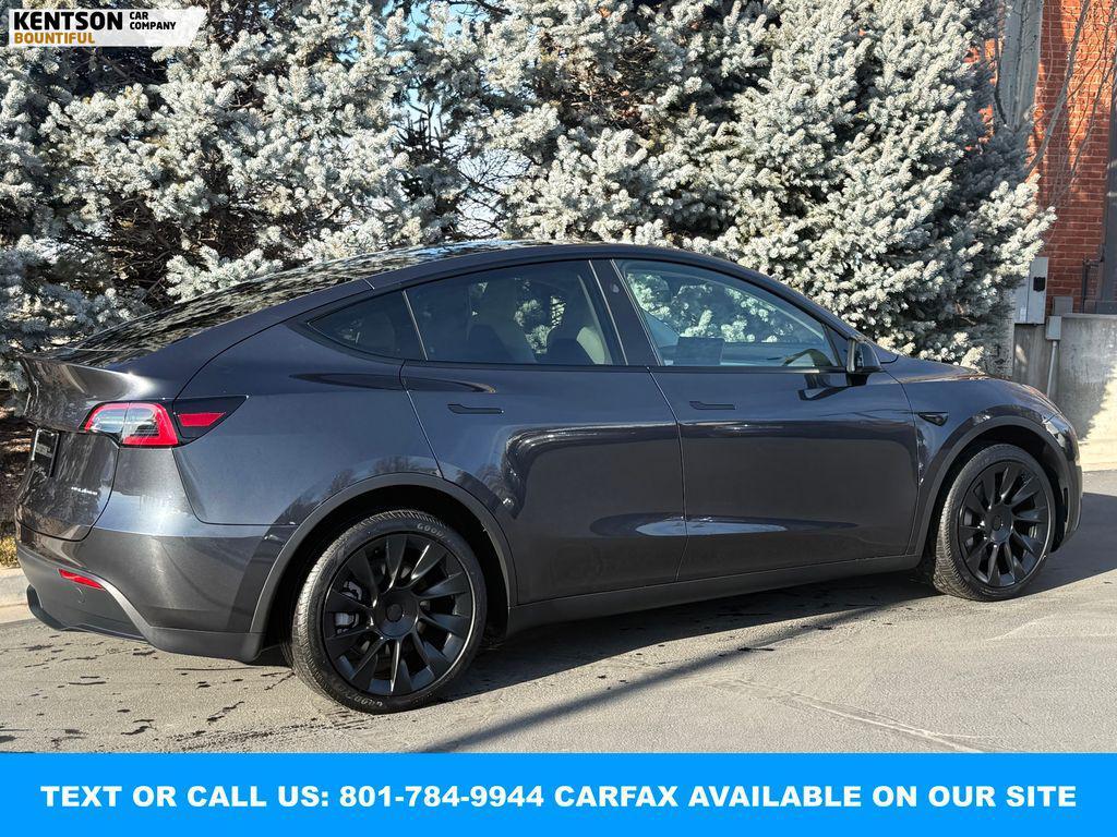 used 2024 Tesla Model Y car, priced at $39,450