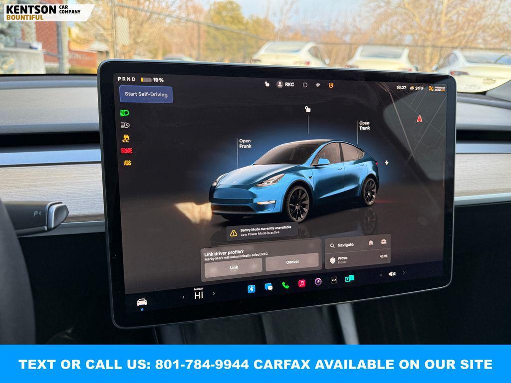 used 2023 Tesla Model Y car, priced at $33,550