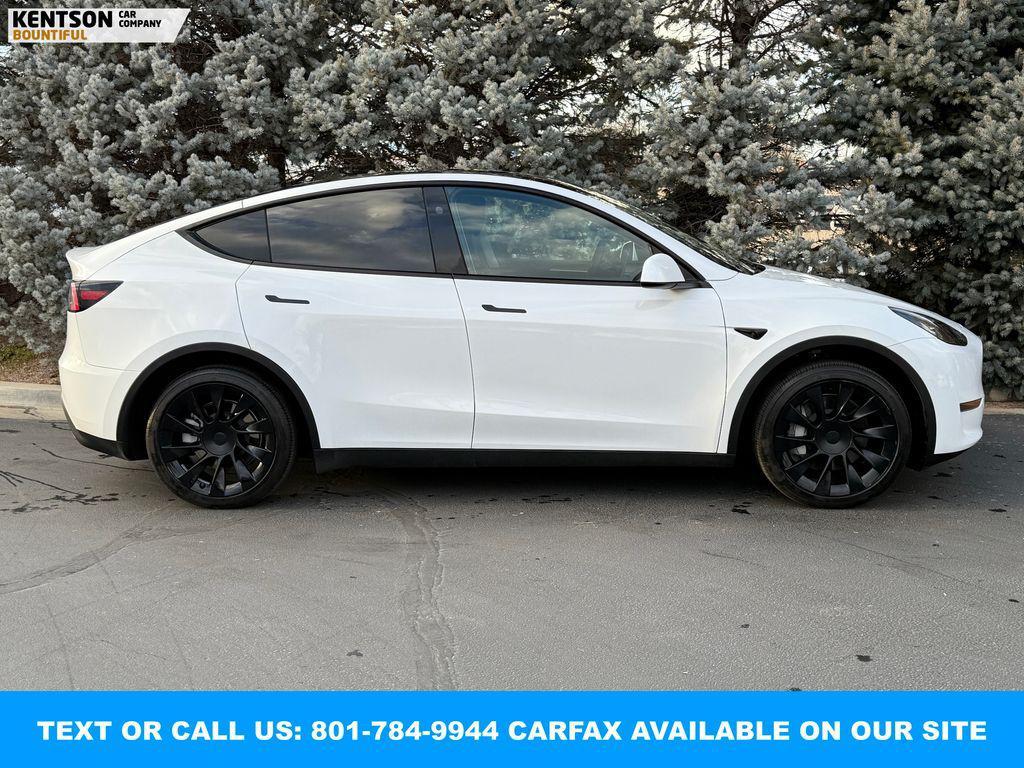 used 2023 Tesla Model Y car, priced at $33,550