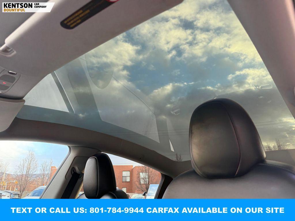 used 2023 Tesla Model Y car, priced at $33,550