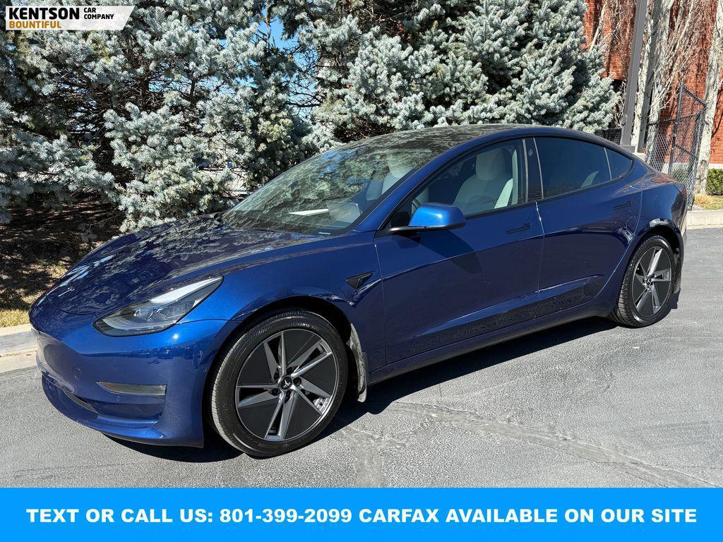 used 2022 Tesla Model 3 car, priced at $27,750