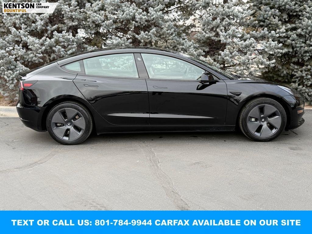 used 2023 Tesla Model 3 car, priced at $28,550