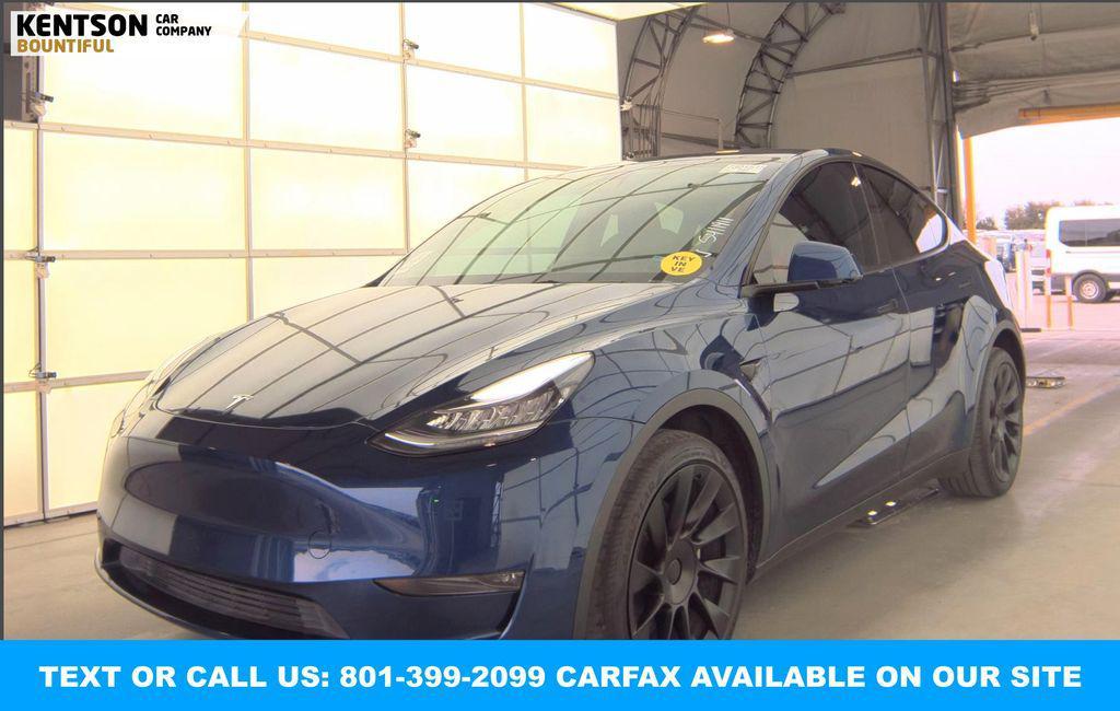used 2023 Tesla Model Y car, priced at $33,650