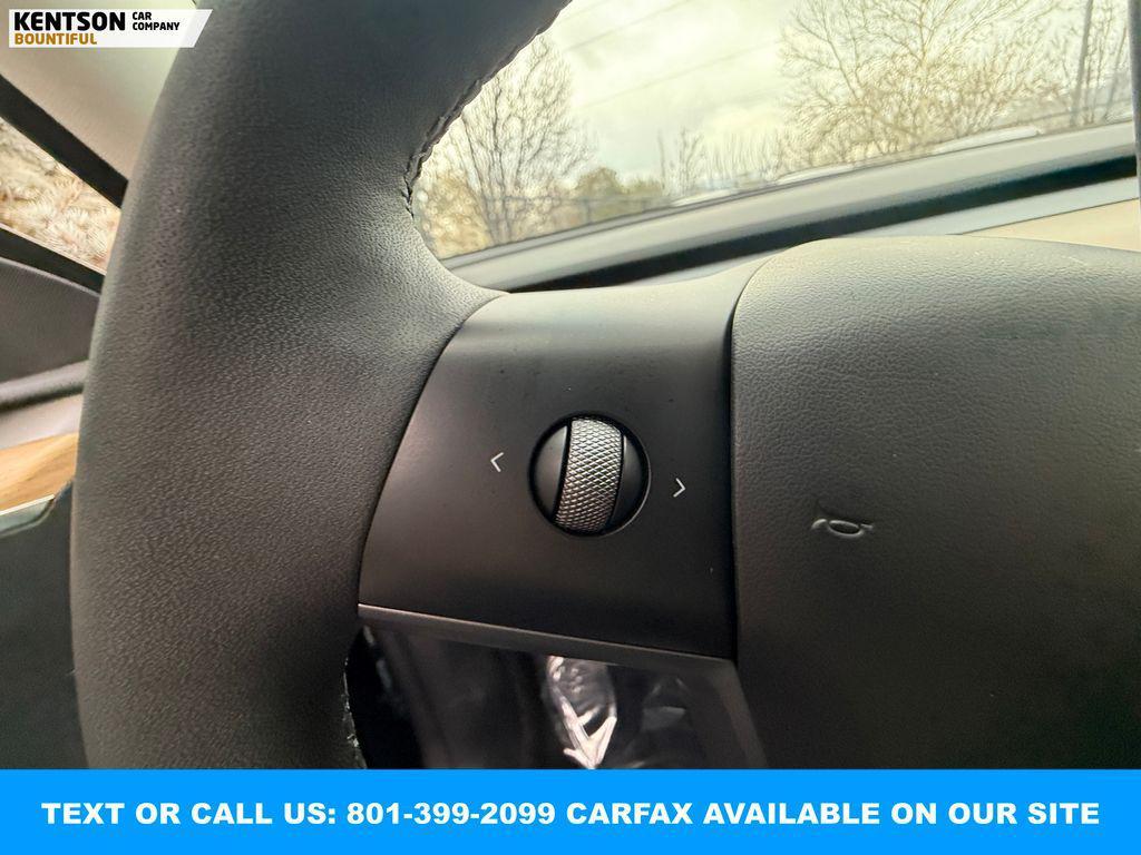 used 2023 Tesla Model Y car, priced at $34,750