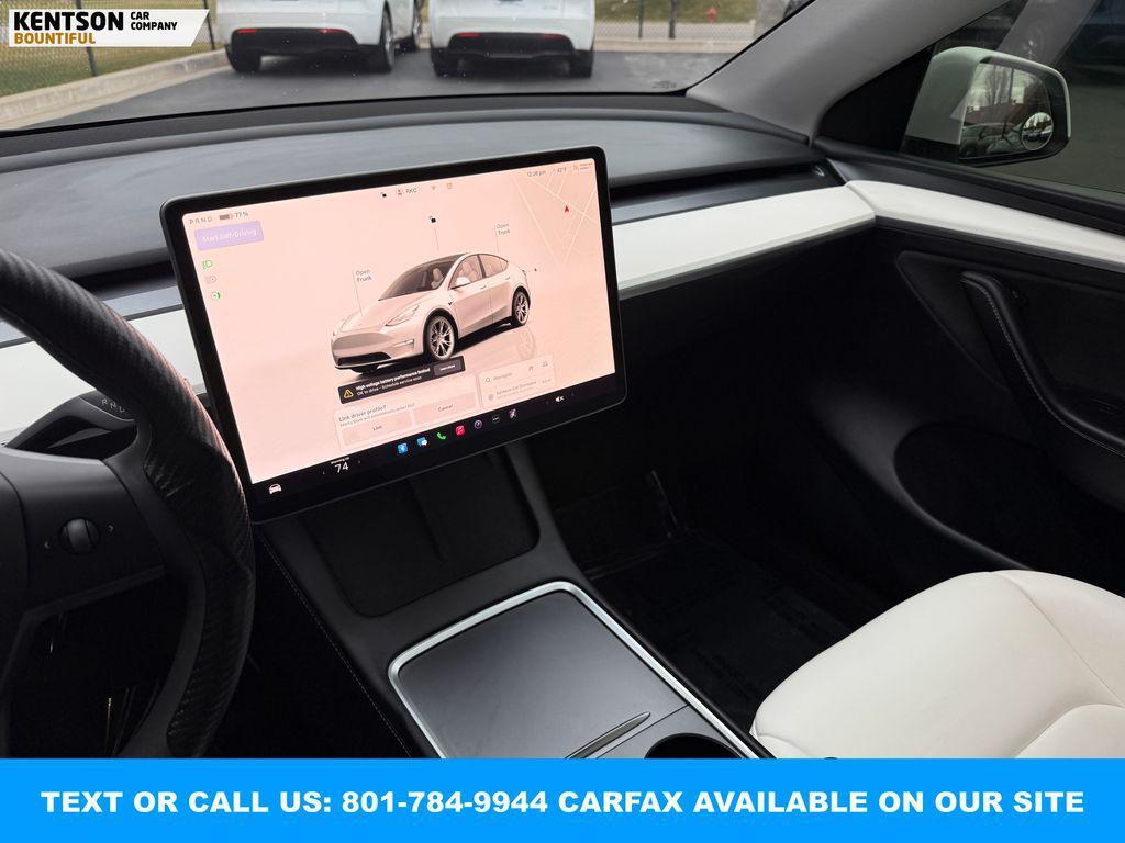 used 2023 Tesla Model Y car, priced at $32,950