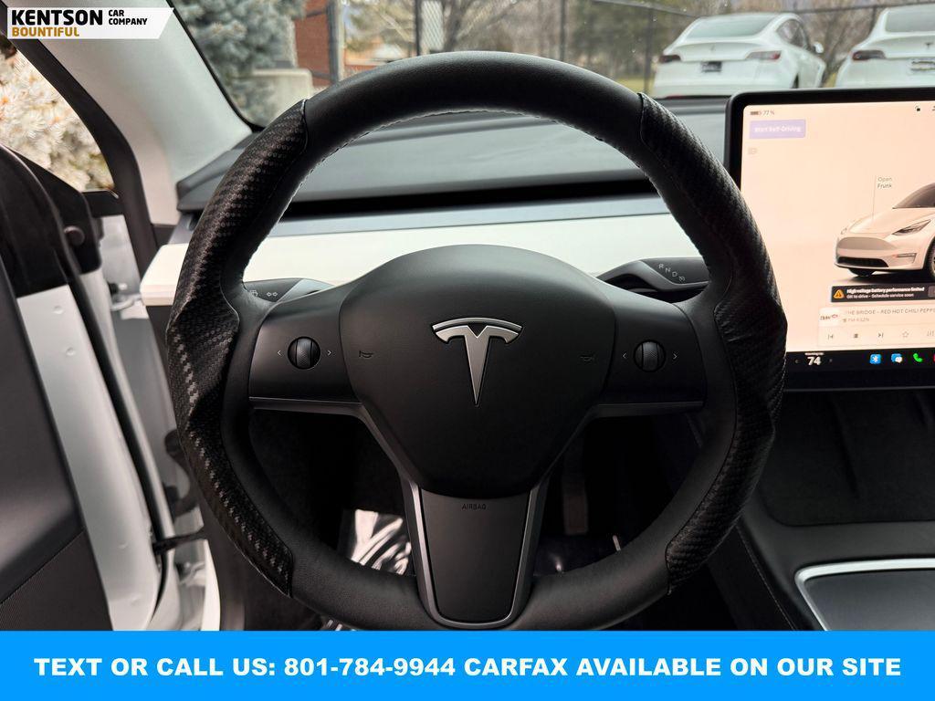 used 2023 Tesla Model Y car, priced at $32,950