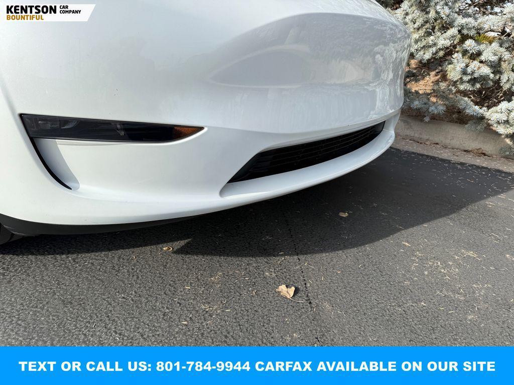 used 2023 Tesla Model Y car, priced at $33,650