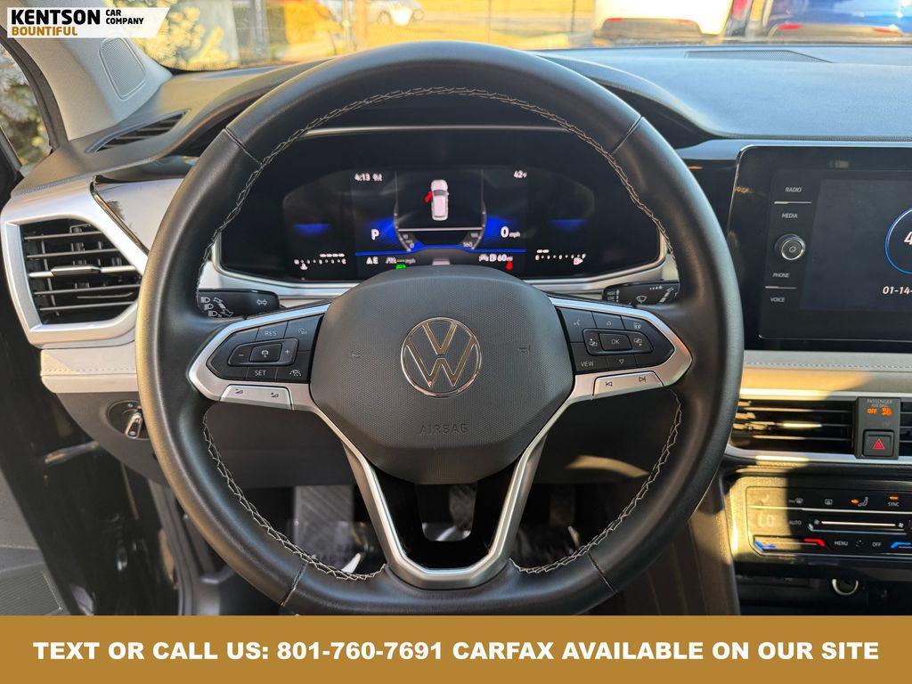 used 2025 Volkswagen Taos car, priced at $24,950