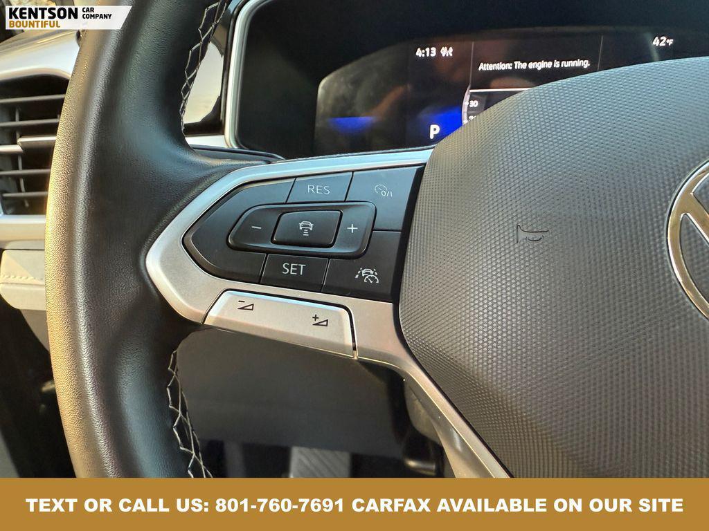 used 2025 Volkswagen Taos car, priced at $24,950