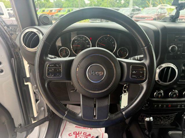 used 2013 Jeep Wrangler Unlimited car, priced at $12,452