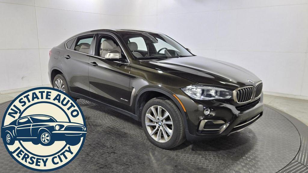 used 2019 BMW X6 car, priced at $24,100