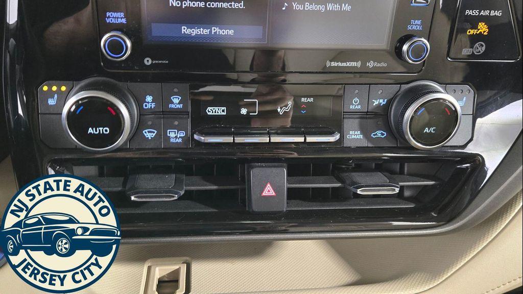 used 2021 Toyota Highlander Hybrid car, priced at $29,585