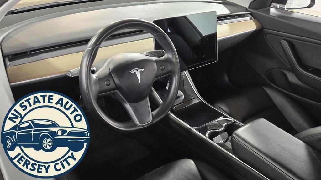 used 2018 Tesla Model 3 car, priced at $15,319