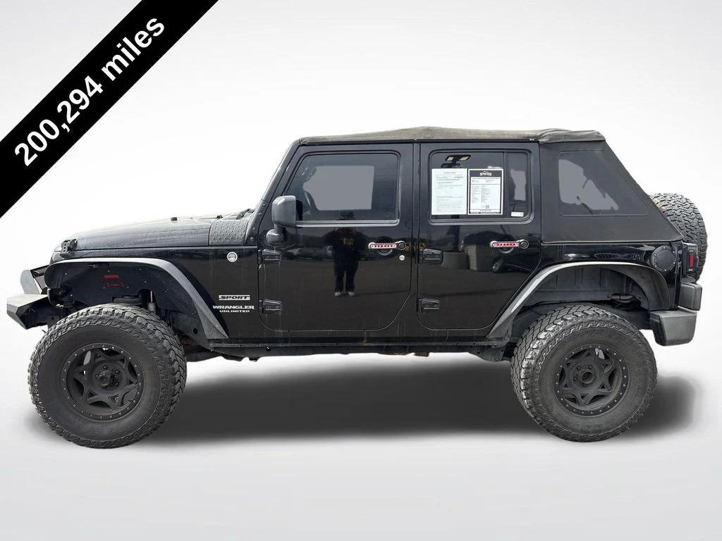 used 2013 Jeep Wrangler Unlimited car, priced at $11,399