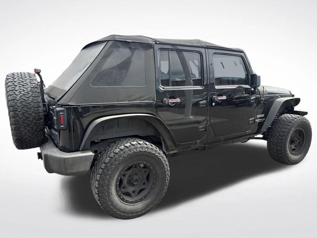 used 2013 Jeep Wrangler Unlimited car, priced at $11,399