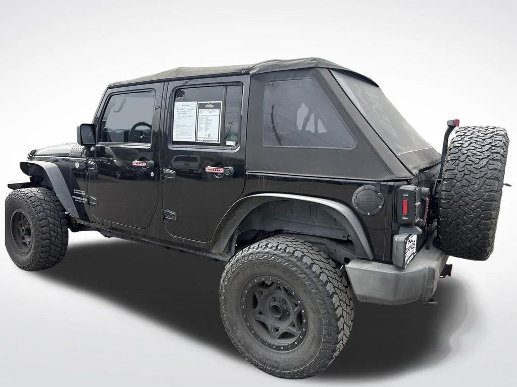 used 2013 Jeep Wrangler Unlimited car, priced at $11,399