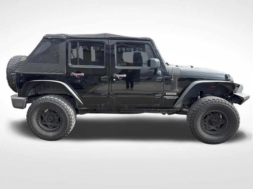 used 2013 Jeep Wrangler Unlimited car, priced at $11,399