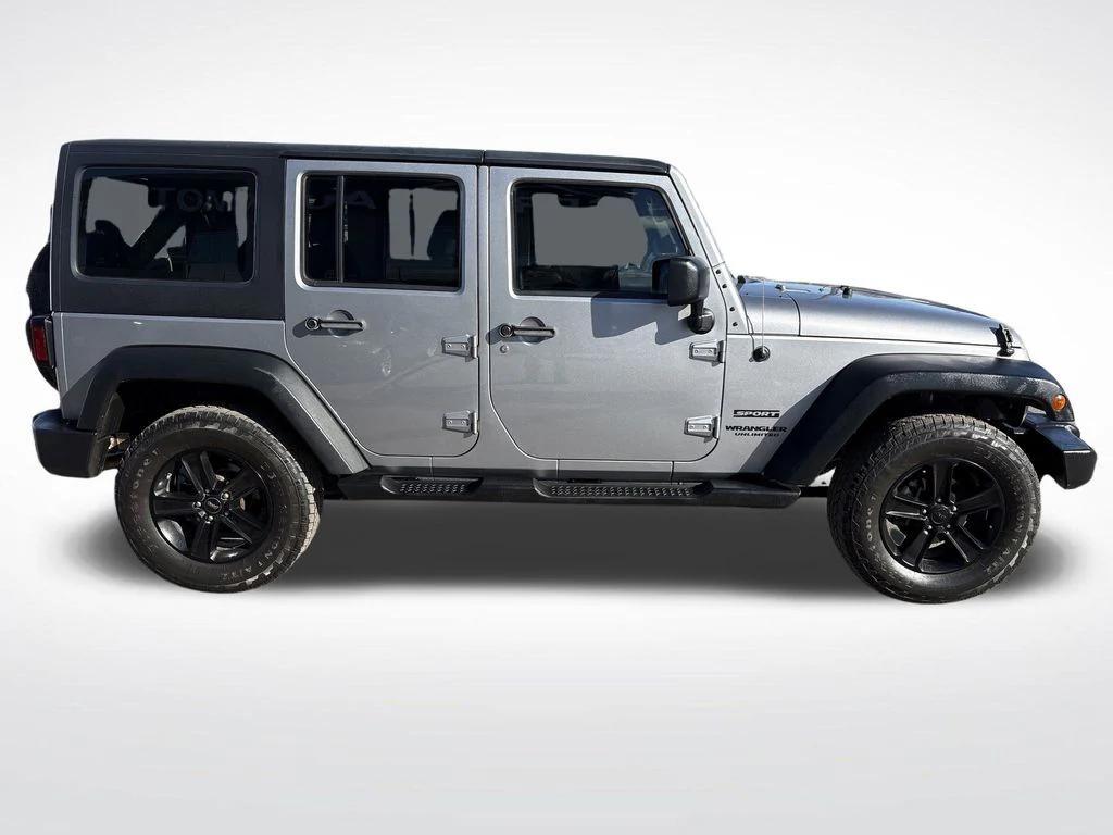used 2013 Jeep Wrangler Unlimited car, priced at $13,699