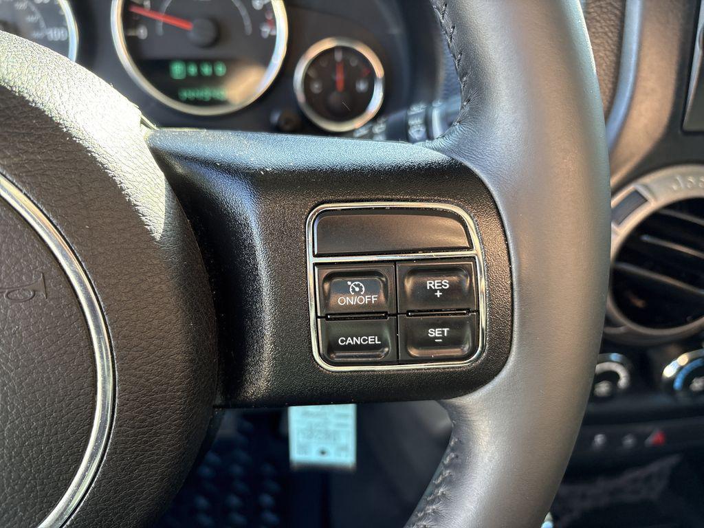 used 2013 Jeep Wrangler Unlimited car, priced at $13,699