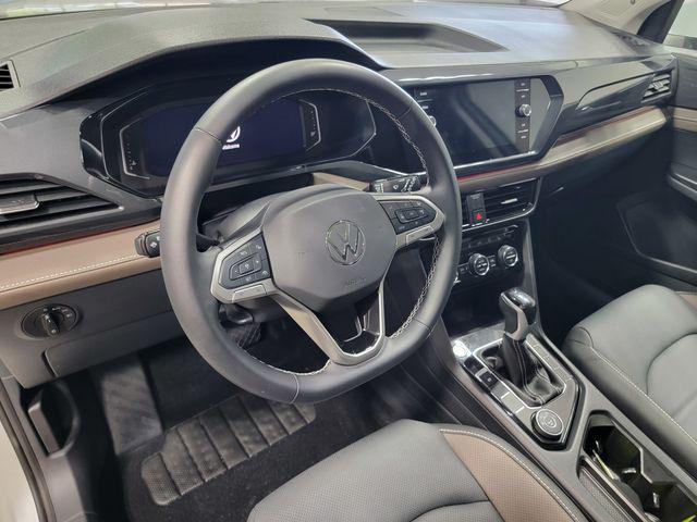 used 2024 Volkswagen Taos car, priced at $26,925