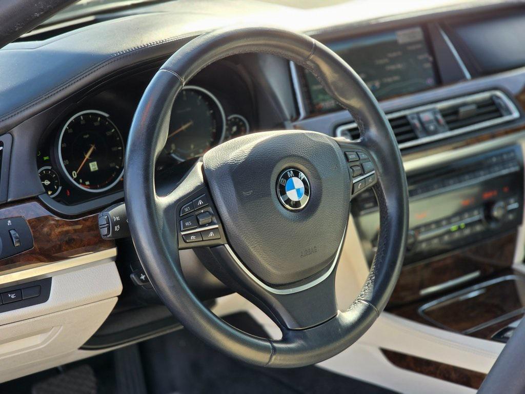 used 2015 BMW 750 car, priced at $19,995