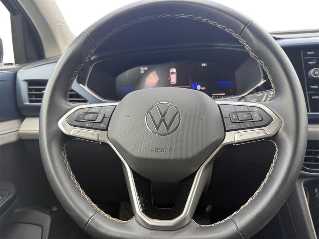 used 2024 Volkswagen Taos car, priced at $17,799
