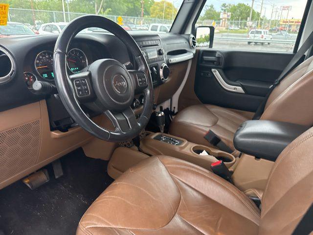 used 2016 Jeep Wrangler Unlimited car, priced at $23,441