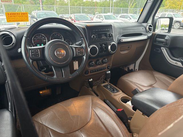 used 2016 Jeep Wrangler Unlimited car, priced at $23,441