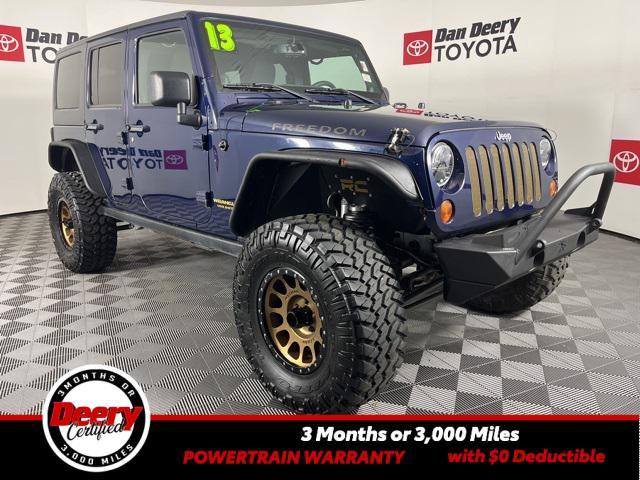 used 2013 Jeep Wrangler Unlimited car, priced at $17,198