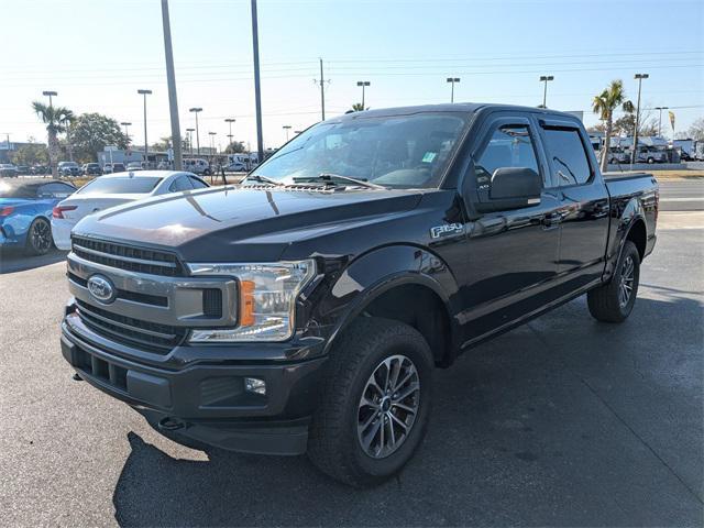 used 2018 Ford F-150 car, priced at $23,900