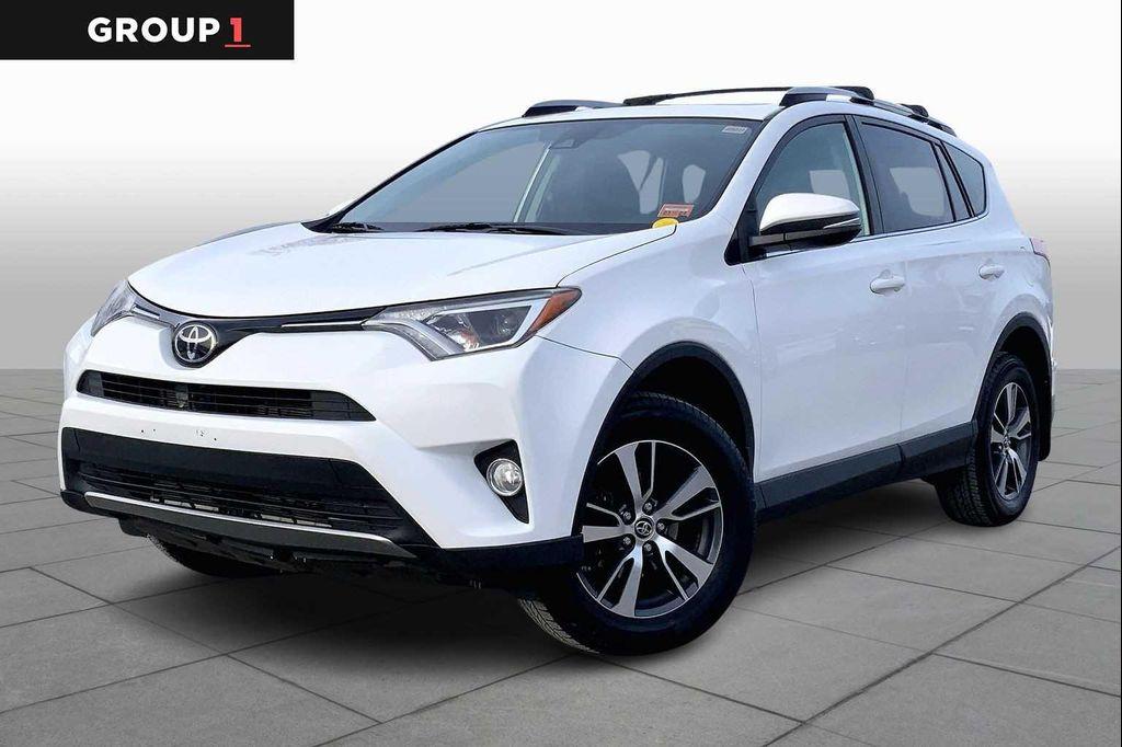 used 2018 Toyota RAV4 car, priced at $19,624