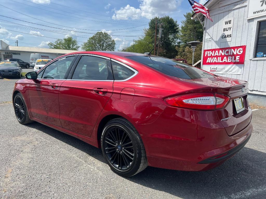 used 2016 Ford Fusion car, priced at $9,999