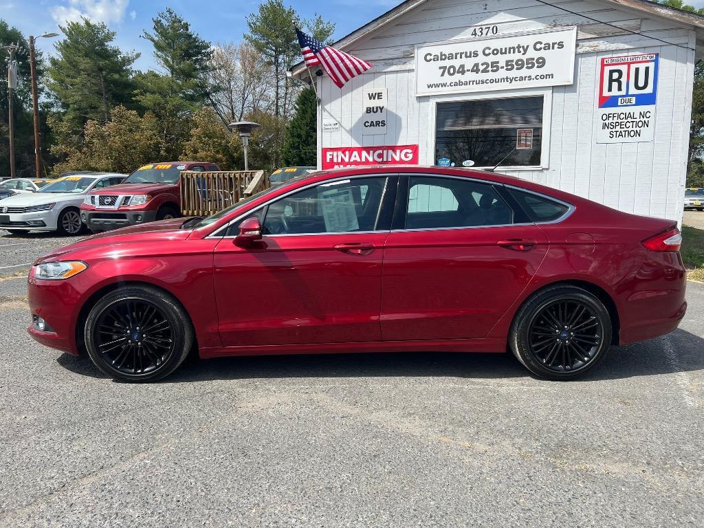 used 2016 Ford Fusion car, priced at $9,999