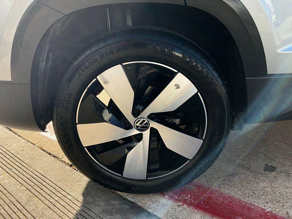 used 2025 Volkswagen Taos car, priced at $19,901