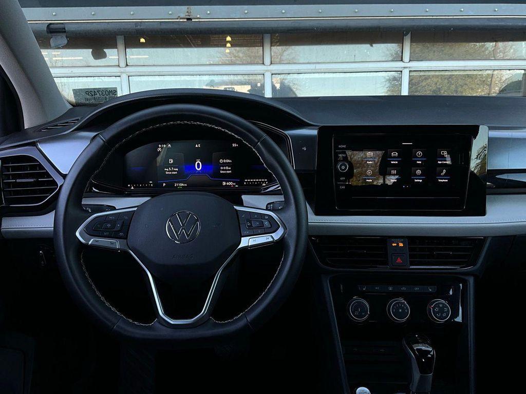 used 2025 Volkswagen Taos car, priced at $19,901