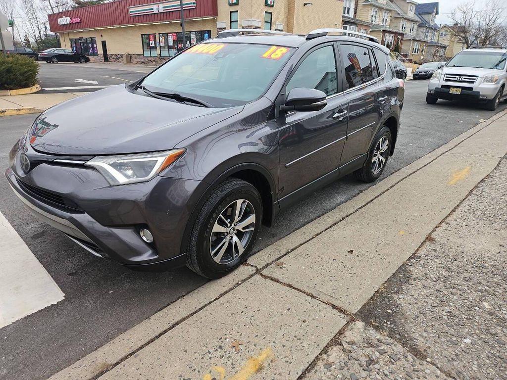 used 2018 Toyota RAV4 car, priced at $13,999
