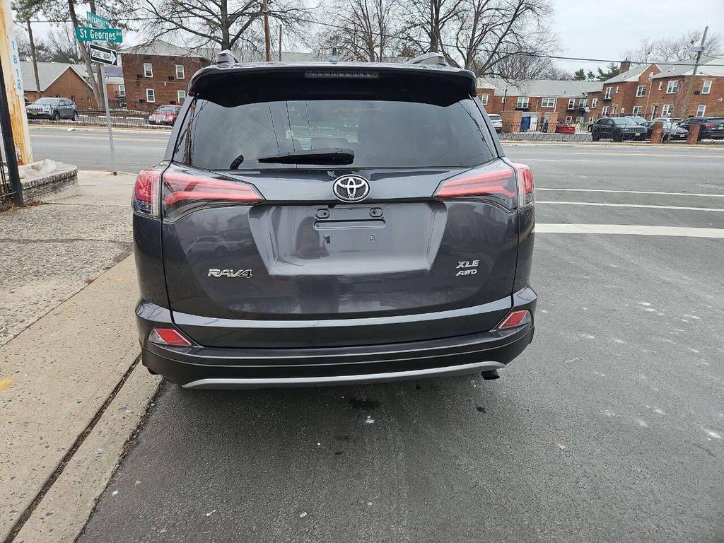 used 2018 Toyota RAV4 car, priced at $13,999